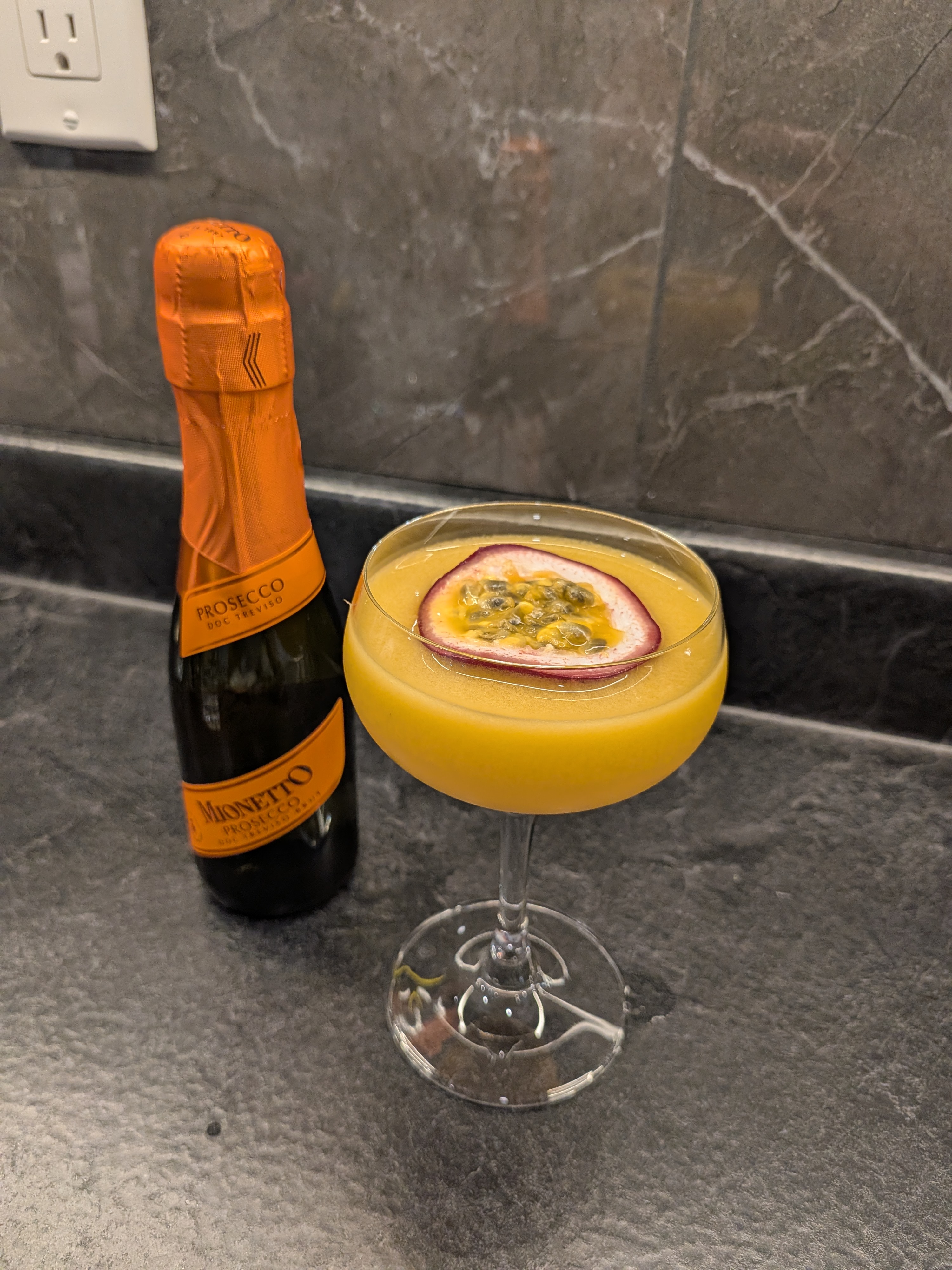 A pornstar martini in a coupe glass